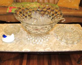 Marble top coffee table with Fostoria punch bowl