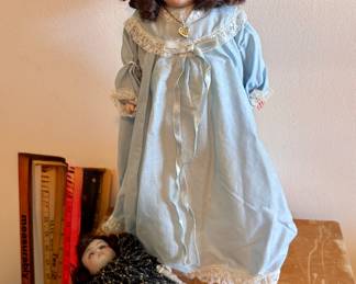 Porcelain doll with leather body