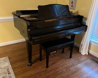 Black Lacquered Piano. Samick brand. $1000 OBO. MUST HIRE PROFESSIONAL MOVERS!