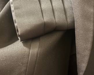 Lanvin Paris black wool tuxedo set with satin peak lapels, matching trousers, and cummerbund — classic formalwear in excellent vintage condition.