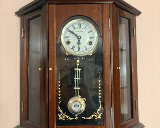 Curio style pendulum clock