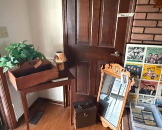 Antique side tables, and mirrors.