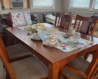 Wood table with 2 captains chairs and 4 side chairs