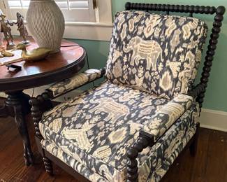 Great chair. Looks like out of Africa movie. Ikat upholstery. 