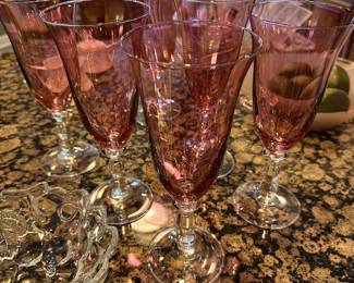 Six cranberry and Crystal flutes