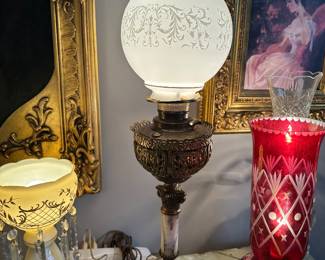 Three matching sets of electric antique luster’s and several antique electrified parlor-buffet lamps