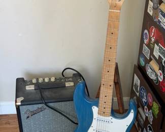 Electric Guitar With Stand & Fender Amp