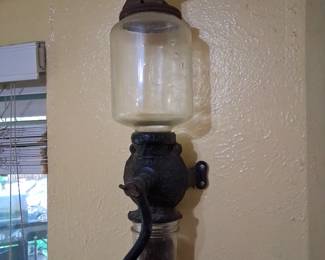 Antique wall mounted coffee grinder