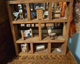 Shelves with miniature furniture 