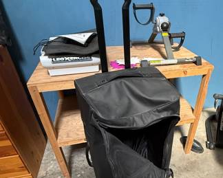 Oakley rolling suitcase