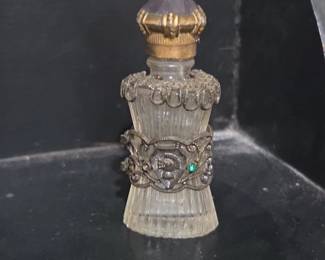 Victorian Style Perfume Bottle with Ornate Metalwork and Amethyst Stopper