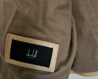 Dunhill label on Beige leather coat.