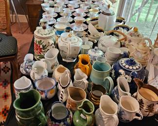 Pitchers, tea post & teacups and saucers, (items sold separately).