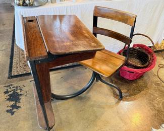 Child's antique desk with attached chair