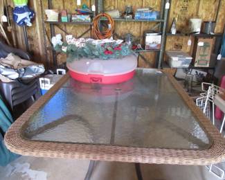 WIcker and glass table