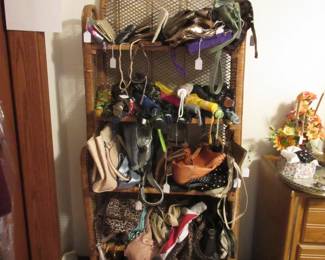 Wicker shelf with lots of purses