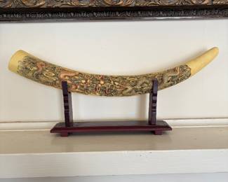 Carved ivory tusk with dragon design 