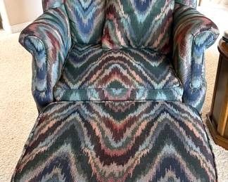 Upholstered arm chair + ottoman