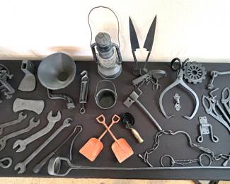 Assorted antique cast iron tools (wrenches, ice block tongs, bridges, pot, curtain rods)
