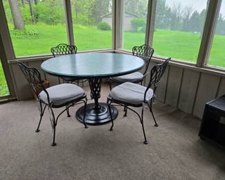 Extra chairs go with this table