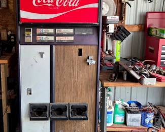 Older Coke Machine and comes with a key to unlock
