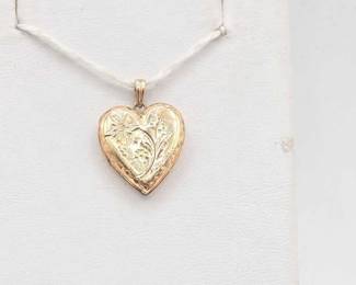 814  10kt Gold Heart Shaped Locket, 1.5g