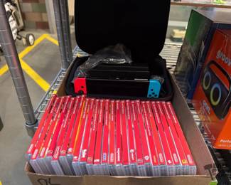 6244  Nintendo Switch with Carrying Case, Docking Station, and Video Games