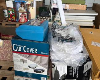 5028  4 Car Covers, Towels, Tire Chains, and Ottlite