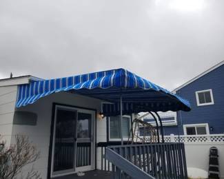 Blue & white awnings with supports. Two awnings available