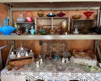 Lots of glass baskets and collectibles 