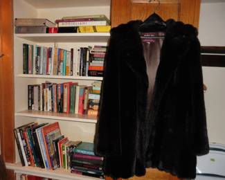Faux Fur Coat and Books