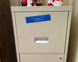filing cabinet with Christmas figurines