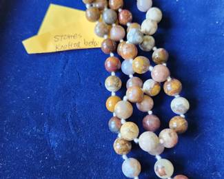 Stone Necklace with special Knots in between the Stones.