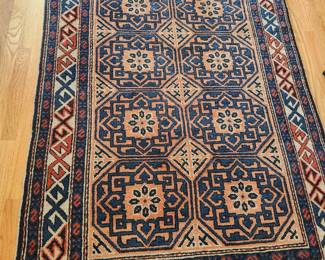 Afghan Antique Handwoven Rug. There are many handmade carpets.