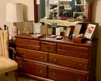 Photo frames, dresser with mirror 
