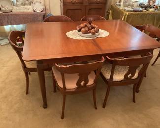 Dining table have 3 more leaves and more chairs