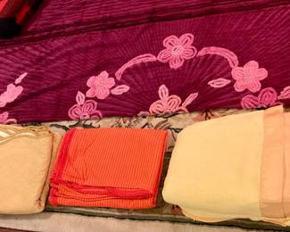 Lots of wool blankets, bedspreads 