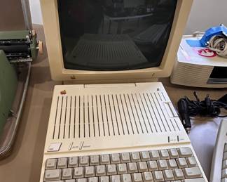 Vintage 1980s Mac computer and keyboard
