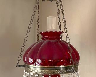 This hanging lamp has a matching table lamp in the next photo.  Note also the clear glass at the top, which lends itself to the "hurricane" lamp style (though this is electric).