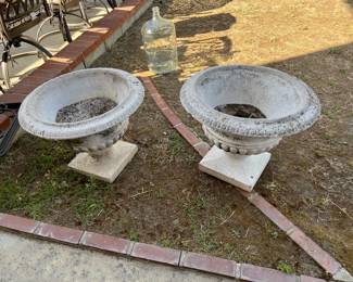 Outside you might find these matching pedestal plant pots, or deep bird bahs, or shallow fish ponds...