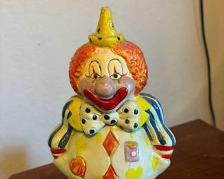 Don’t clown around with your money!  This precious clown is a bank!