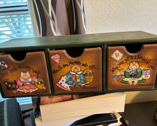 Three drawer box with rag doll painted on them