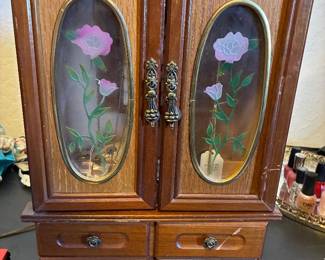 Wooden jewelry box with glass doors