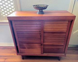 Vintage small maple slat front sliding doors chest