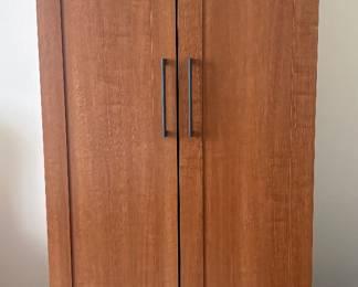 Free-standing Armoire with clothes rack, shelf and drawer. Measurements as follows: 71"H / 29"W / 20.25"D 