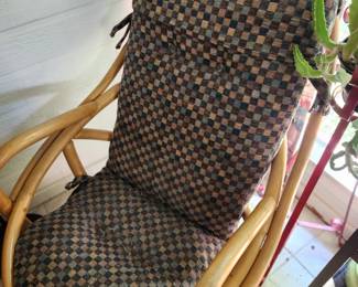Two Vintage Rattan Rocking Chairs with Cushions.