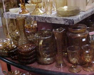 Amber glass and yellow depression glass.