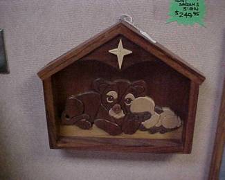 Lion shall lie down by the lamb, wooden art.