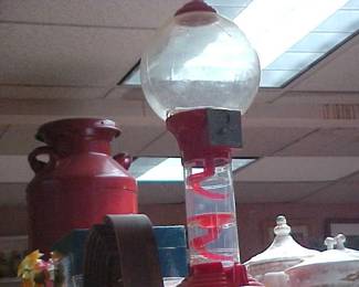 Giant gumball machine.  Milk Can.  Casserole dishes and lids.