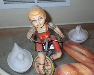 VTG TIN TOY BOY ON BIKE